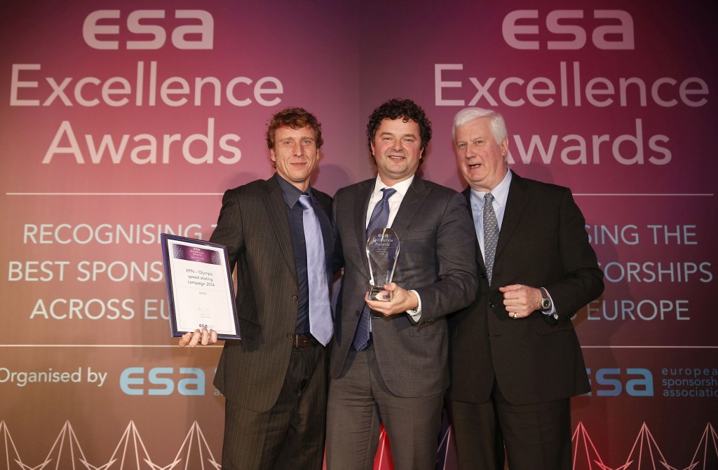Dominic Lyle of the EAC (R) presents the ESA Best of Europe Gold Award to Mark Versteegen of KPN during the ESA Awards Ceremony at 155 Bishopsgate on January 29, 2014 in London, England.
