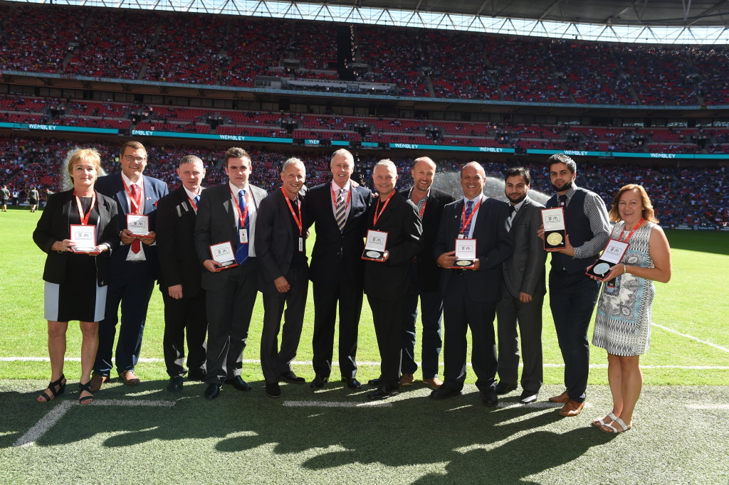 LONDON, ENGLAND - AUGUST 02:  Match officials pose pitch side prior to the FA Community Shield match between Chelsea and Arsenal at Wembley Stadium on August 2, 2015 in London, England.  (Photo by Michael Regan - The FA/The FA via Getty Images)