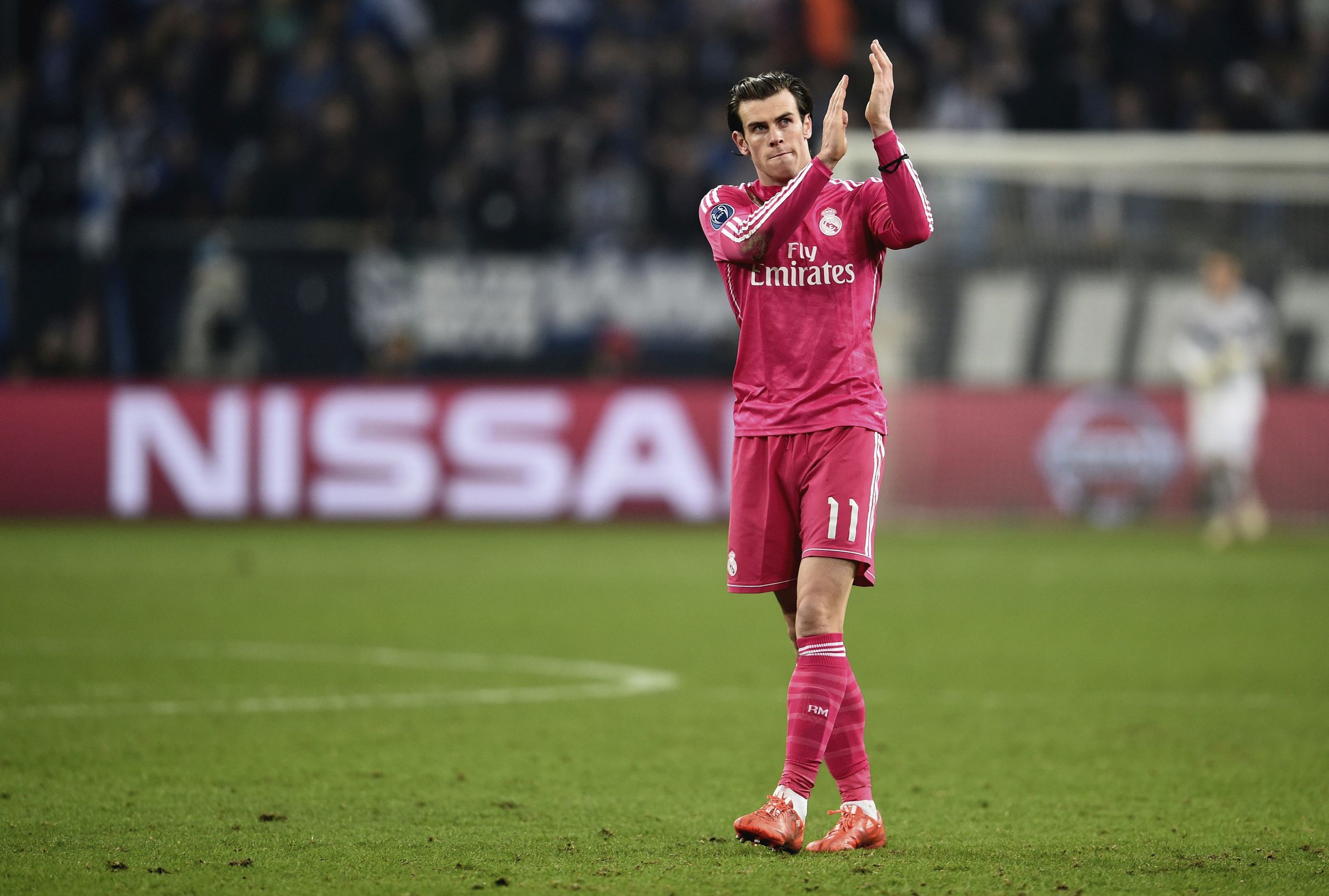 GELSENKIRCHEN, GERMANY - FEBRUARY 18: Gareth Bale of Real Madrid reacts after the final whistle during the UEFA Champions League Round of 16 match between FC Schalke 04 and Real Madrid at the Veltins-Arena on February 18, 2015 in Gelsenkirchen, Germany. (Photo by Dennis Grombkowski/Bongarts/Getty Images)